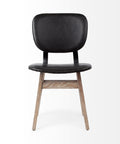 Black chair with wooden legs on a white background