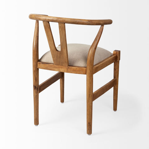 Wooden chair with a beige cushion on a white background