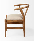 Wooden chair with a beige cushion on a white background
