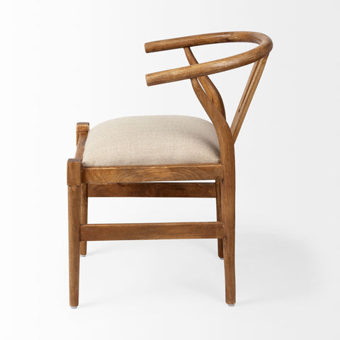 Wooden chair with a beige cushion on a white background
