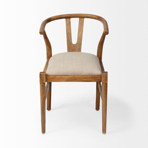 Wooden chair with beige cushion on a white background