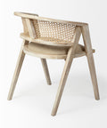Wooden chair with woven backrest on a white background