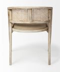 Wicker chair with a natural finish on a white background