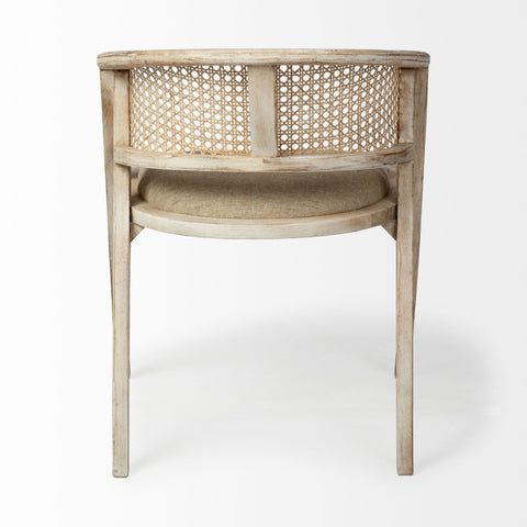 Wicker chair with a natural finish on a white background