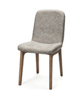 Gray upholstered chair with wooden legs on a white background