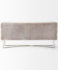 Modern sideboard with textured surface and metal legs on a white background