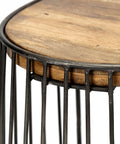 Round wooden table with metal frame on a white background