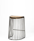 Small round side table with wireframe base and wooden top on a white background