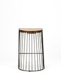 Small round stool with wireframe design and wooden top on a white background