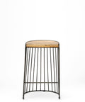 Bar stool with wooden seat and metal frame on a white background