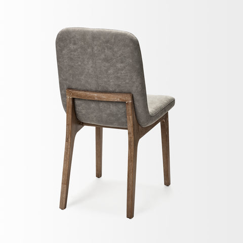 Gray upholstered chair with wooden legs on a white background