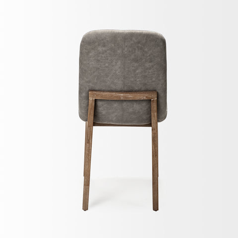 Chair with gray cushioned backrest and wooden legs on a white background