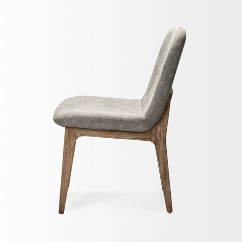 Gray upholstered chair with wooden legs on a white background