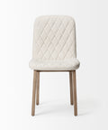 White quilted chair with wooden legs on a white background