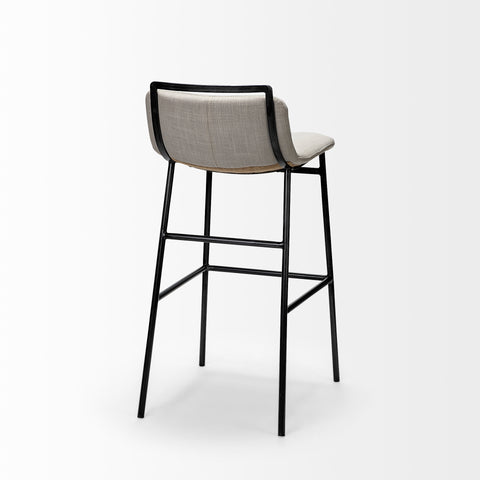 Modern bar stool with black frame and gray cushion on a white background