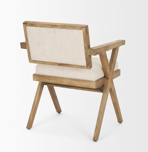 Wooden armchair with beige cushion on a white background