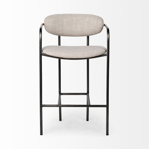 Bar stool with beige cushioned seat and backrest on a white background