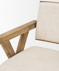 Chair with wooden frame and beige cushion on a white background