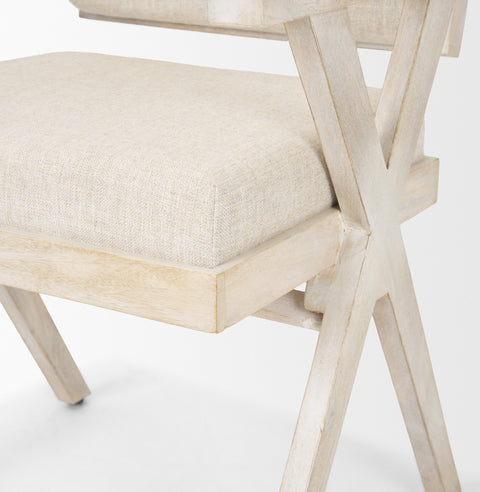 Chair with wooden frame and beige cushion on a white background