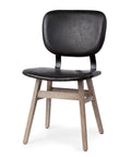 Black chair with wooden legs on a white background