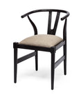 Black chair with beige cushion on a white background