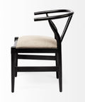 Black chair with beige cushion on a white background