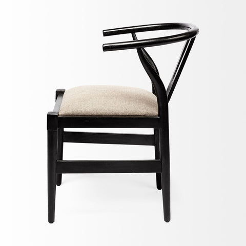 Black chair with beige cushion on a white background
