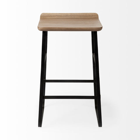 Bar stool with wooden seat and black metal legs on a white background