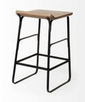 Bar stool with wooden seat and black metal frame on a white background