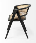 Chair with black frame and woven backrest on a white background