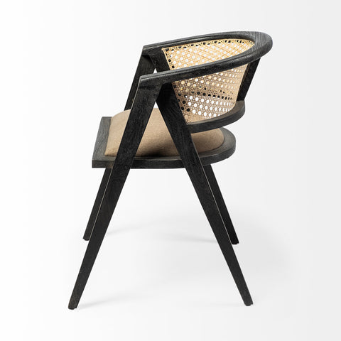 Chair with black frame and woven backrest on a white background