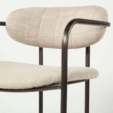 Chair with beige cushioned seat and backrest on a white background