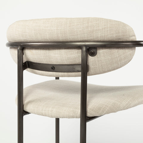 Chair with beige cushioned seat and backrest on a white background