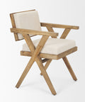 Wooden chair with beige cushion on a white background