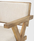 Chair with wooden frame and beige cushion on a white background