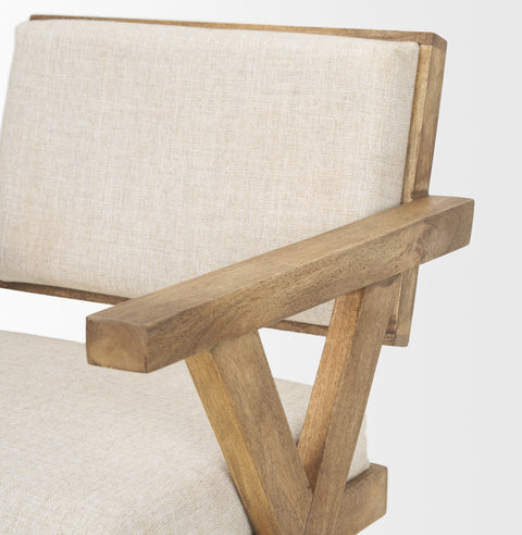 Chair with wooden frame and beige cushion on a white background