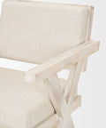 Beige armchair with a modern design on a white background