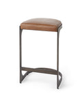 Brown bar stool with a cushioned seat on a white background