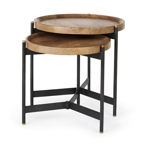 Set of two round wooden tables with black metal stands on a white background