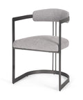 Gray chair with black metal frame on a white background