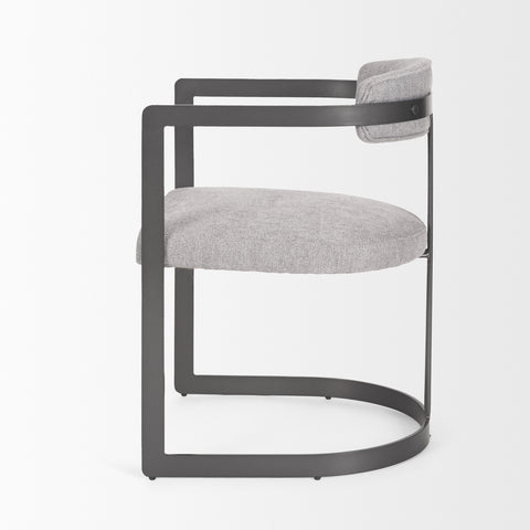 Modern chair with gray cushioned seat and backrest on a white background