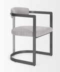 Modern chair with gray cushioned seat and backrest on a white background
