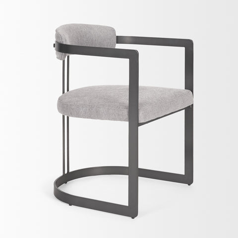Modern chair with gray cushioned seat and backrest on a white background