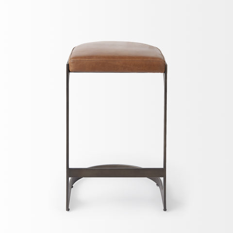 Brown cushioned stool with metal frame on a white background
