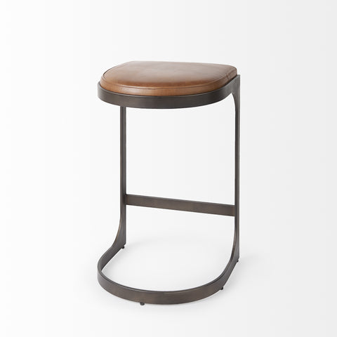 Bar stool with brown cushioned seat and metal frame on a white background