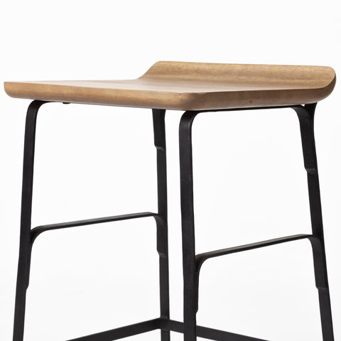 Wooden bar stool with black metal legs on a white background