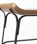 Wooden bench with black metal frame on a white background