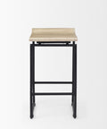 Bar stool with wooden seat and black metal frame on a white background