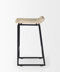 Bar stool with wooden seat and black metal frame on a white background