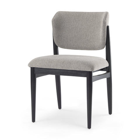 Gray upholstered chair with black frame on a white background